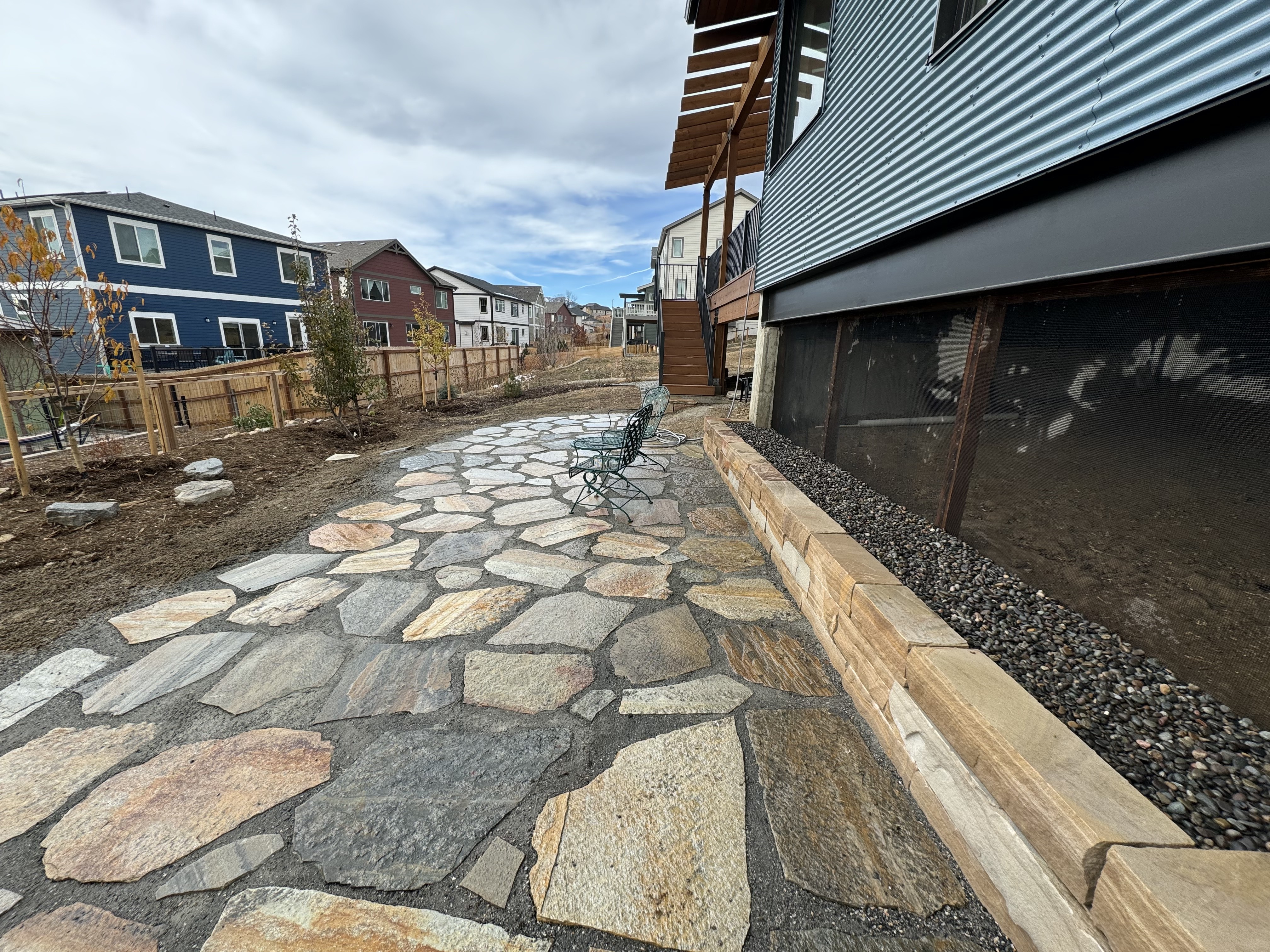 Flagstone patio with retaining wall
